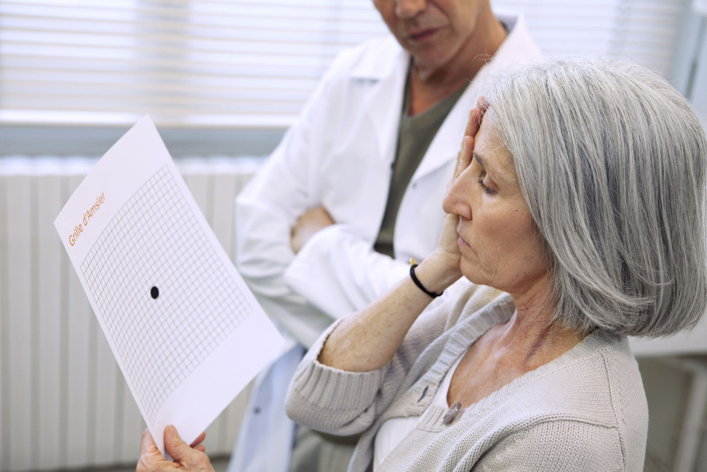 Woman getting tested for macular degeneration.